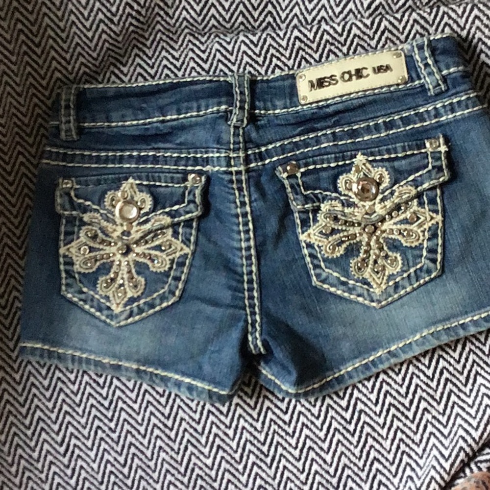 Miss chic jean shorts with designs on back size m